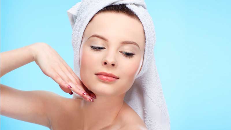 A woman caring for her skin.