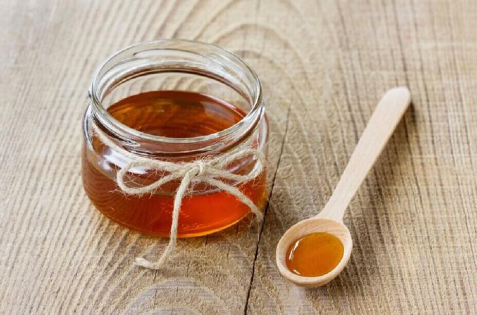 Remedy with honey for headaches