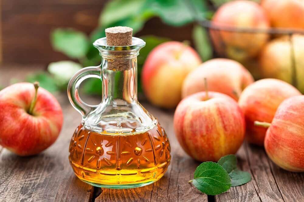 A bottle of apple cider vinegar.