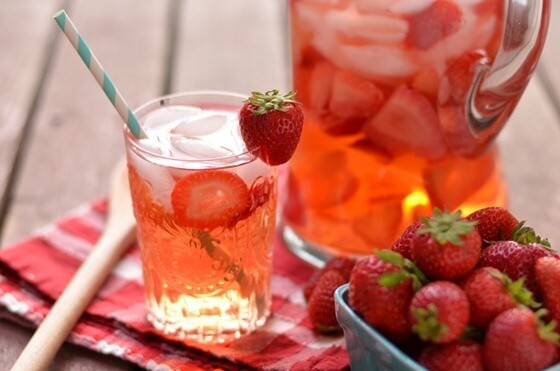 A refreshing glass of strawberry and lemon drink.