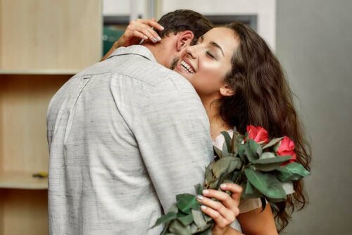woman and man embracing with flowers; seduce your partner