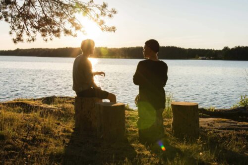 Two people by the lake.