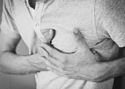 man in pain due to heart attack