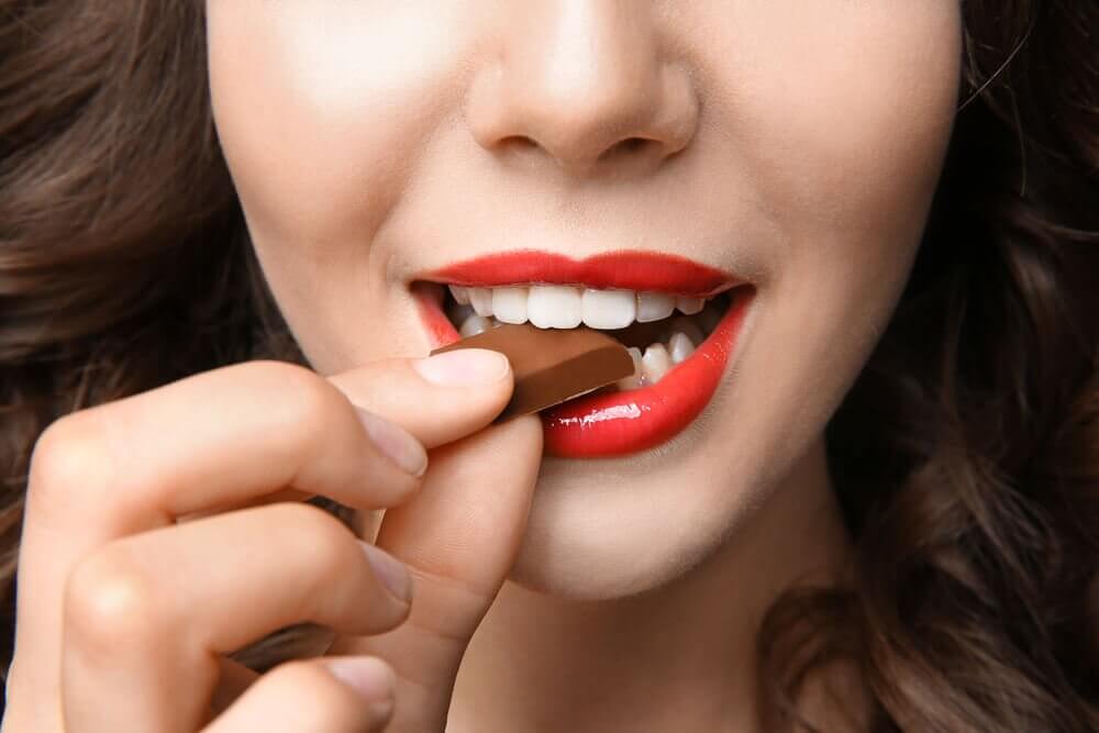 woman-eating-chocolate