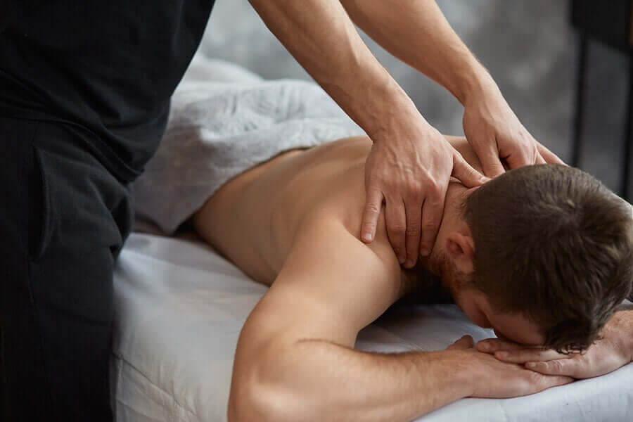 A man getting a neck massage.