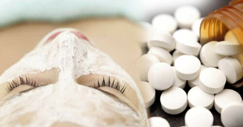 A woman with an aspirin mask.
