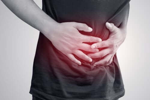 A man with abdominal discomfort who needs to get rid of gas.