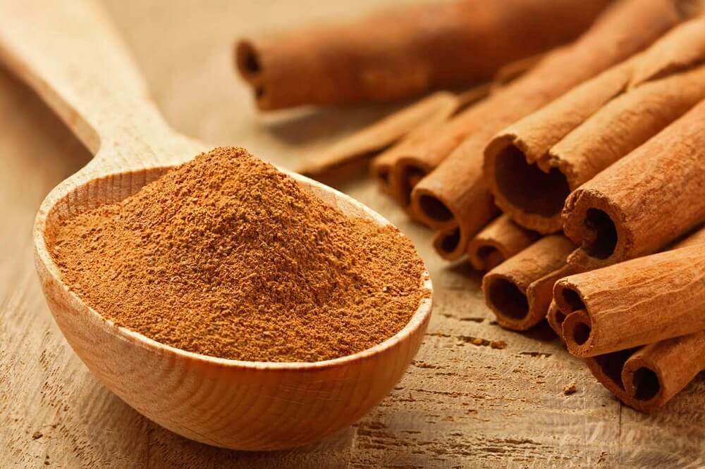 Cinnamon in a wooden spoon