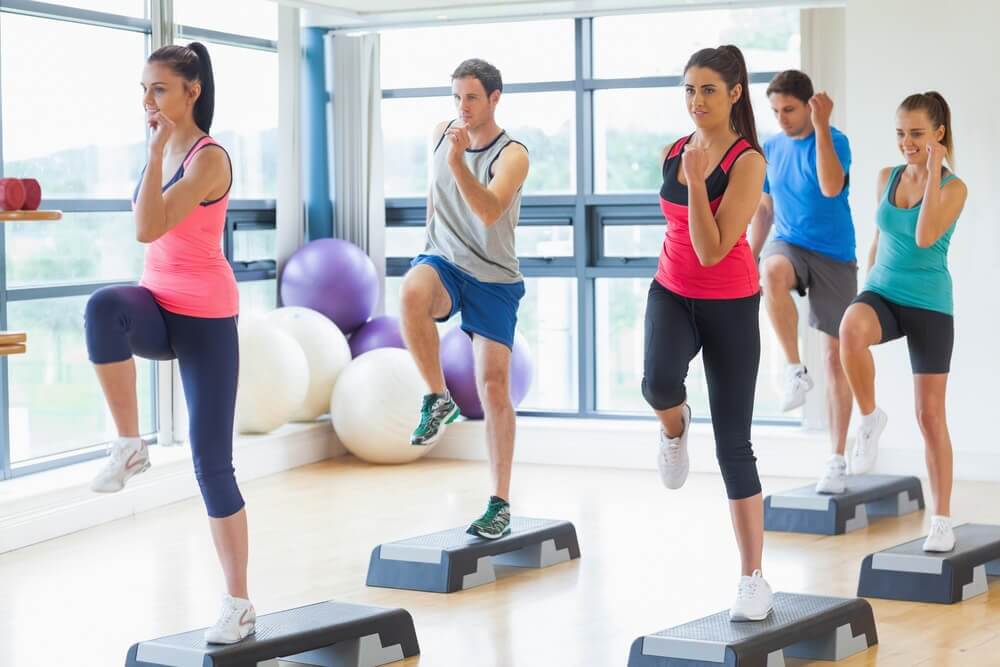 Knees to elbows exercise is great for a trimmer waist.