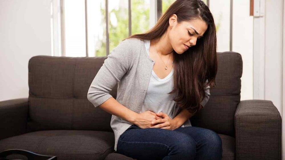 woman with stomach cramps