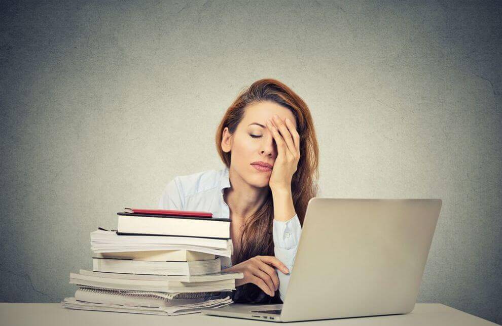 Woman overburdened with work