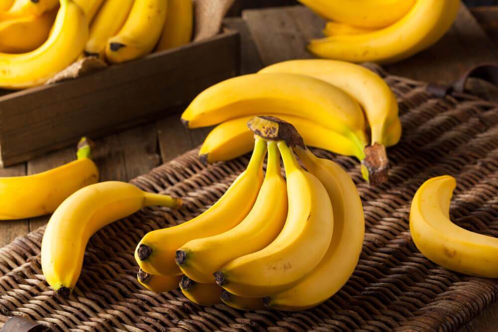 a few banana bunches on a table