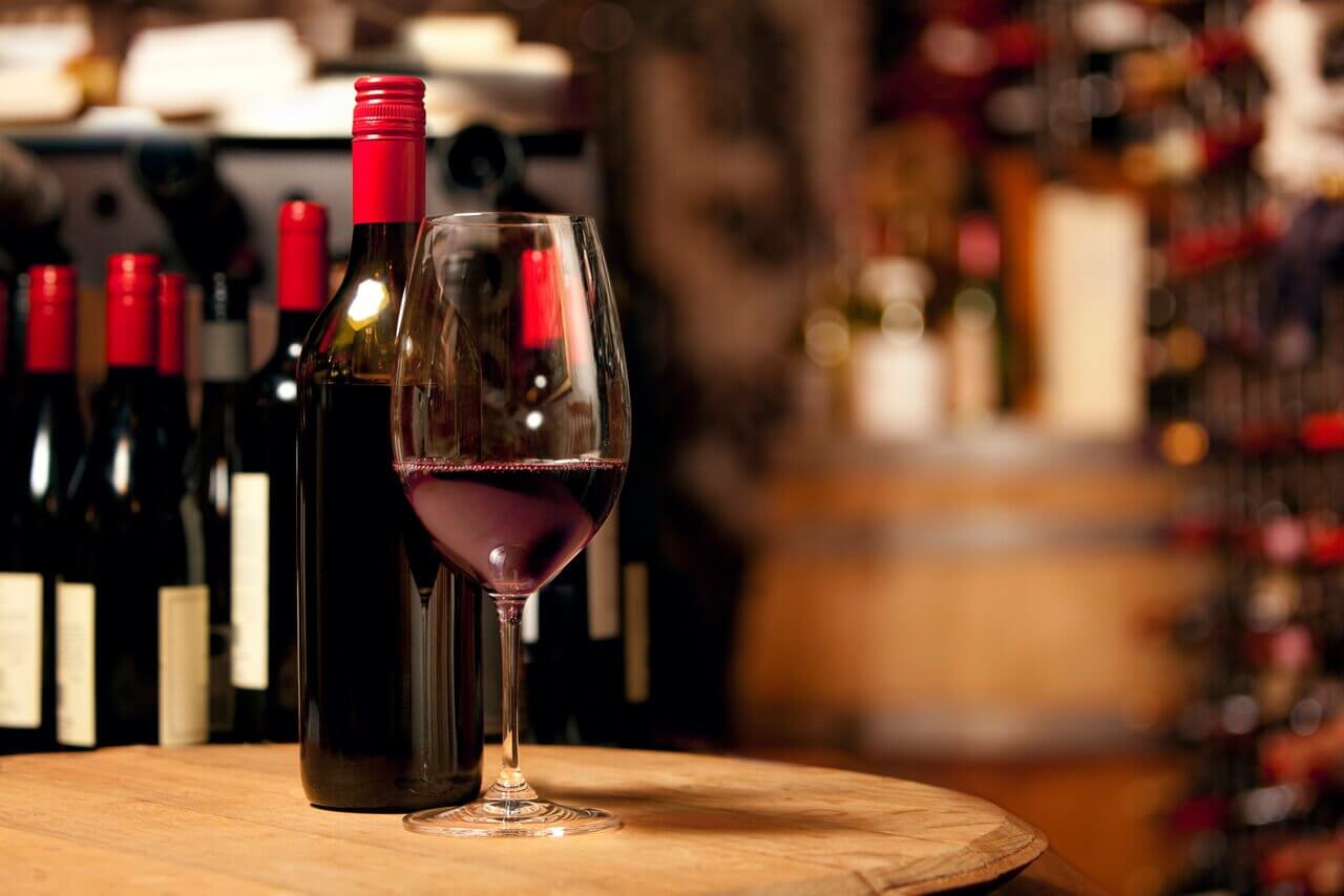 Bottle and glass of red wine