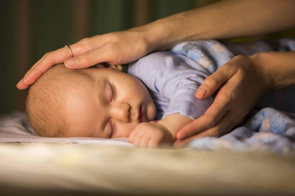 a sleeping newborn baby