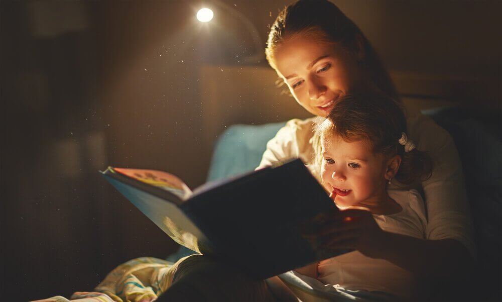 A mother reading a bedtime story.