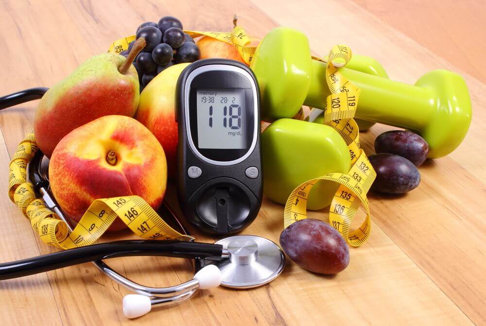 A pile of fruit, sports equipment and a stethoscope
