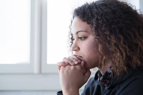 lonely woman staring into space