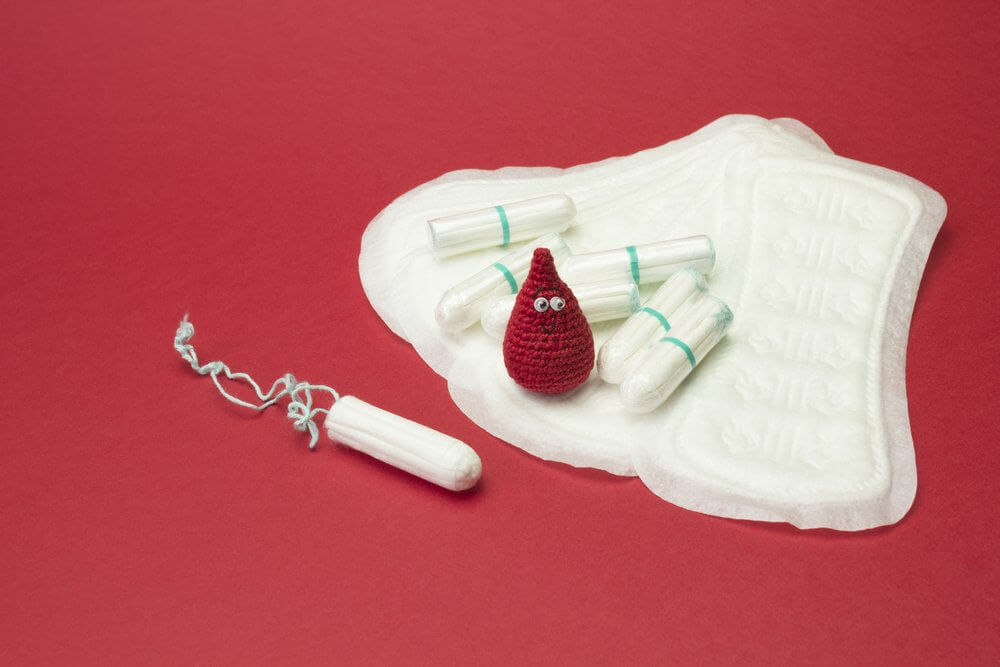 Some knitted menstrual blood on some pads.