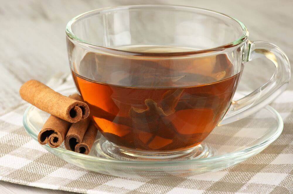 A cup of cinnamon and honey tea.