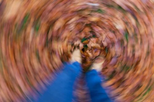 A person with vertigo looking at the ground.