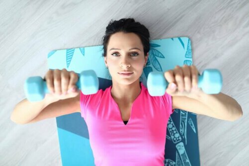 A woman doing exercise on the floor.