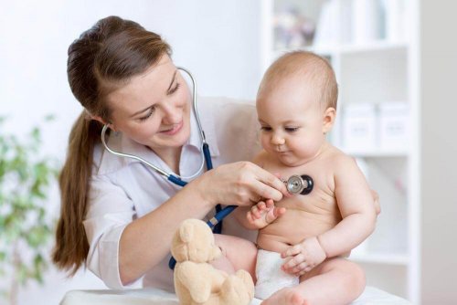 A doctor checking a baby.