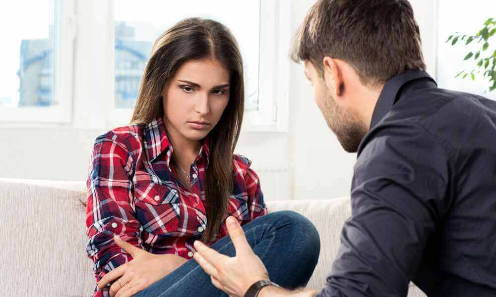 Woman looking sad as she's being rejected