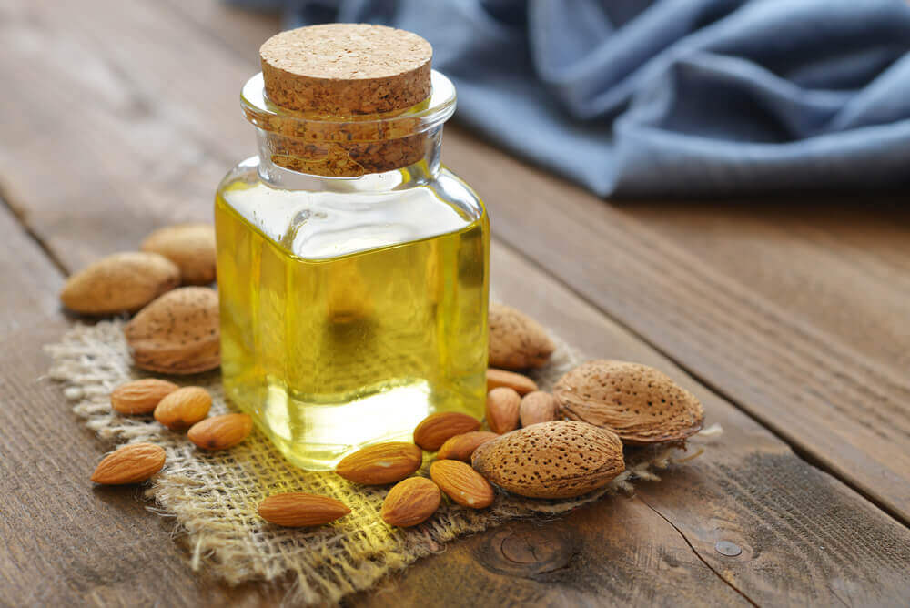 A small jar of almond oil.