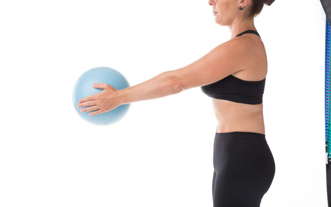 A woman trying to have a trimmer chest.