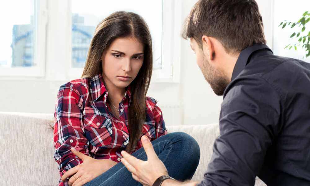 A couple having a difficult conversation.