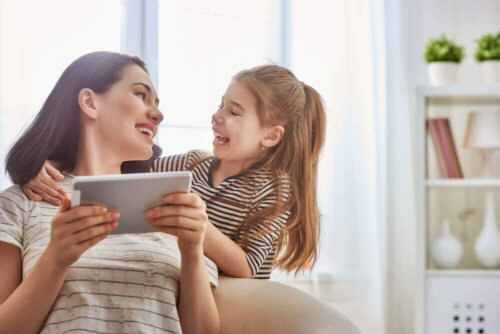 Mother and daughter talking about the early use of technology.