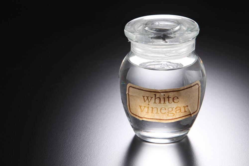 A jar of white vinegar.