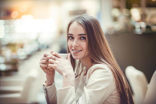 woman drinking a cup of tea