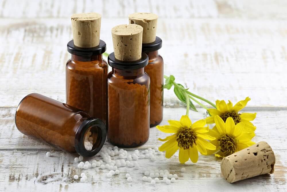 Bottles of arnica oil to treat lower back pain