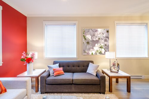A large looking living room with few decorations