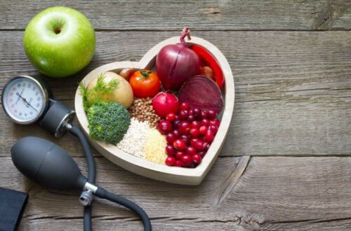 Some healthy foods in a heart shaped bowl
