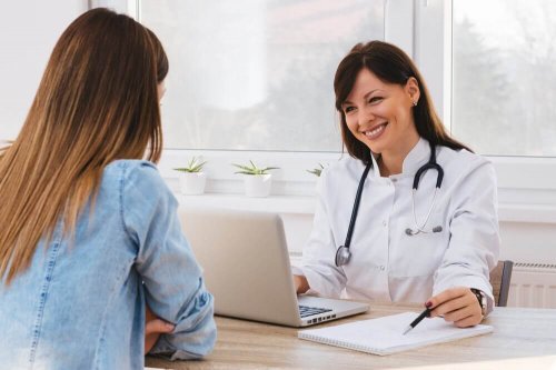 A woman consulting with her doctor