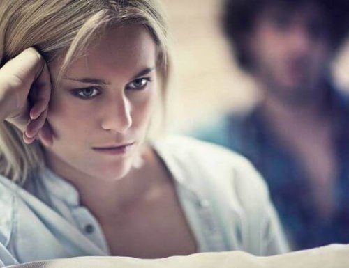 A woman looking stressed and annoyed