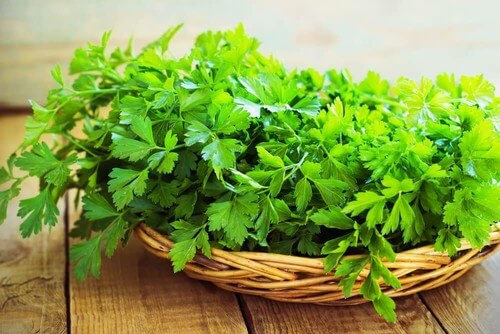 Some parsley on a basket.