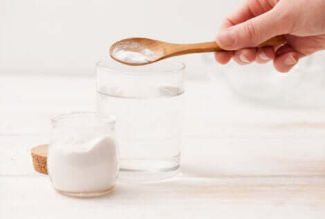 A glass of baking soda and water.