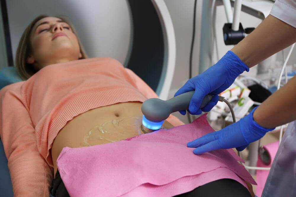 A woman getting ultrasound for twins