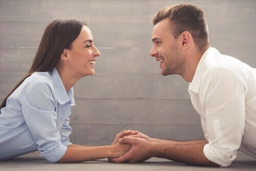A happy couple talking.