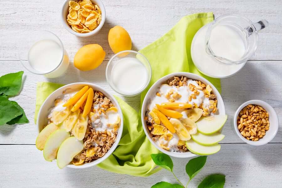 Bowls of granola and apples.