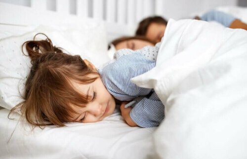 A little girl sleeping.
