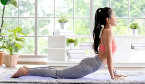 A woman stretching her legs.