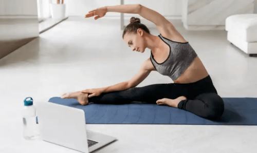 A woman stretching.