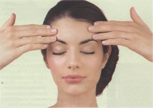 Woman doing a head massage