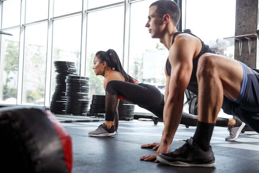 A stretching class at a gym.