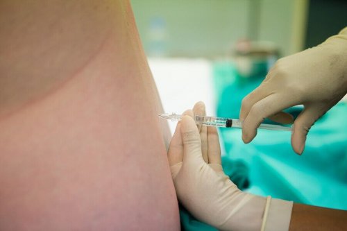 A person receiving an injection.