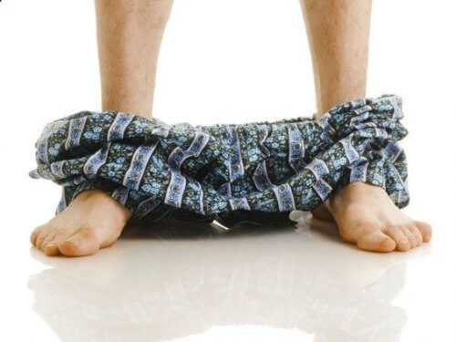 Man with his trousers down.
